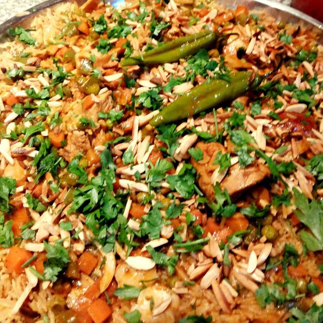 طريقة كبسة الدجاج بالبسلة بالصور 594994220.jpg