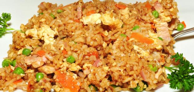 طريقة كبسة الدجاج بالبسلة بالصور 984273813.jpg